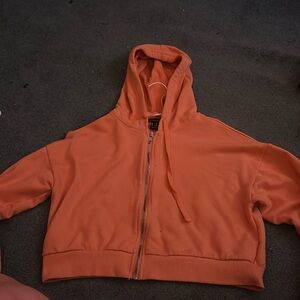 Orange long sleeve crop
